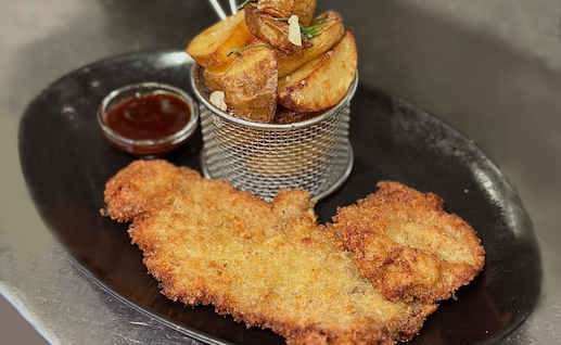 BLACK ANGUS SCHNITZEL WITH BBQ SAUCE AND FRIES